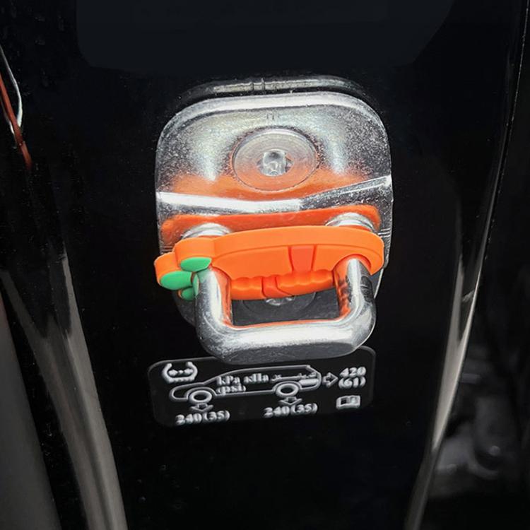 Car door lock cover clip front view, orange silicone pad with green bumper tabs