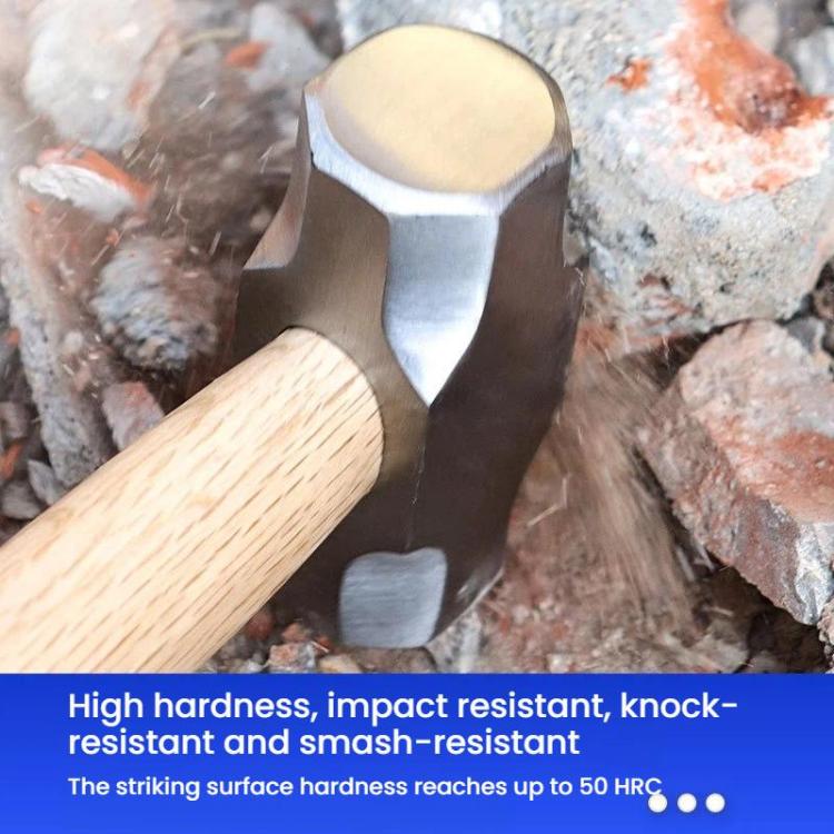 Small hammer with metal wedge-style head and light wood handle on a block