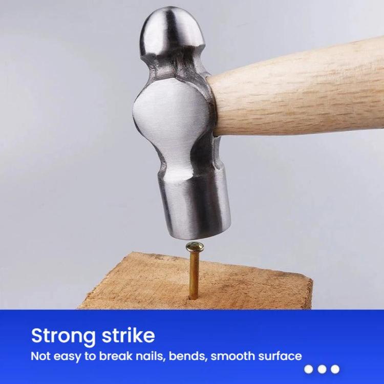 Small hammer with ball end and smooth striking face on a light wood handle