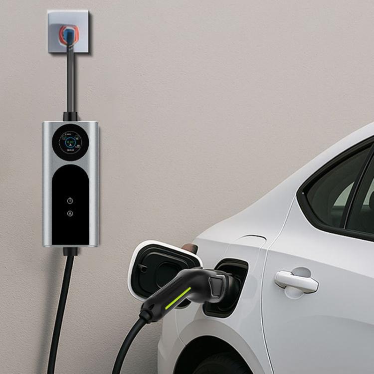 Wall-mounted EV charger with display connected to car charging port via cable