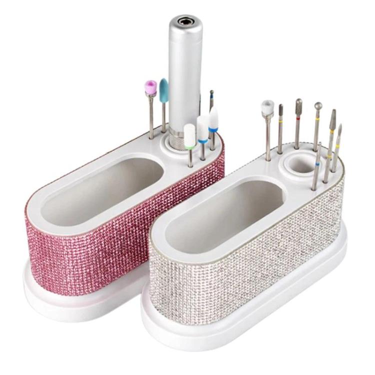 Two-compartment nail tool organizer with pink and white rhinestone bases and tool holders