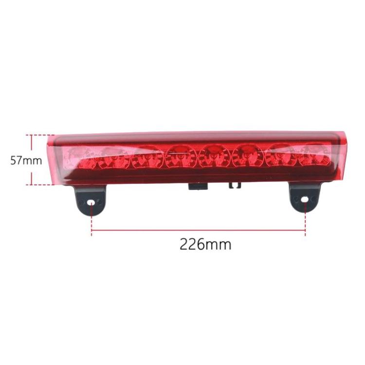 Red rear tail light assembly with clear cover and black mounting brackets