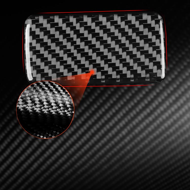 Black carbon-fiber pattern decorative sticker with rounded rectangular shape, close-up
