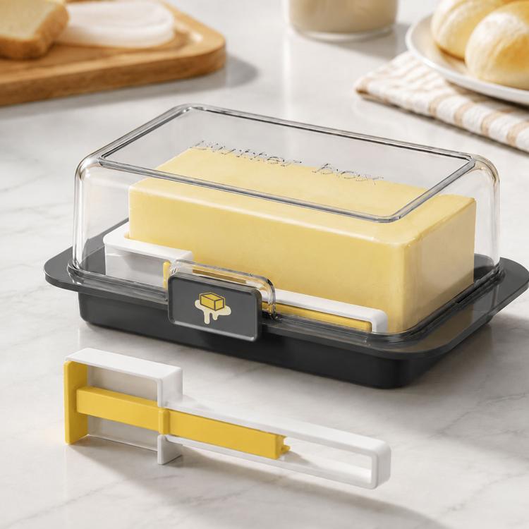 Butter keeper with lid and cutter, clear top, black base, yellow handle
