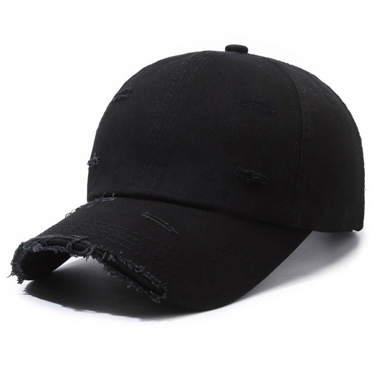 Distressed black ripped baseball cap with frayed brim and torn fabric details