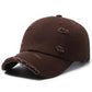 Distressed coffee brown ripped baseball cap with frayed brim and torn front details