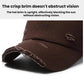 Distressed baseball cap with ripped brim and stitched crown, dark brown