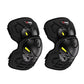 Two black protective elbow and knee pads with yellow reflector panels and molded TPU shells