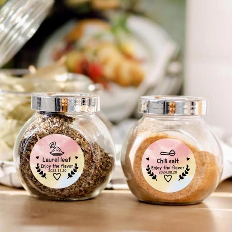Round ingredient labels on clear spice jars, 'Homemade' style design.