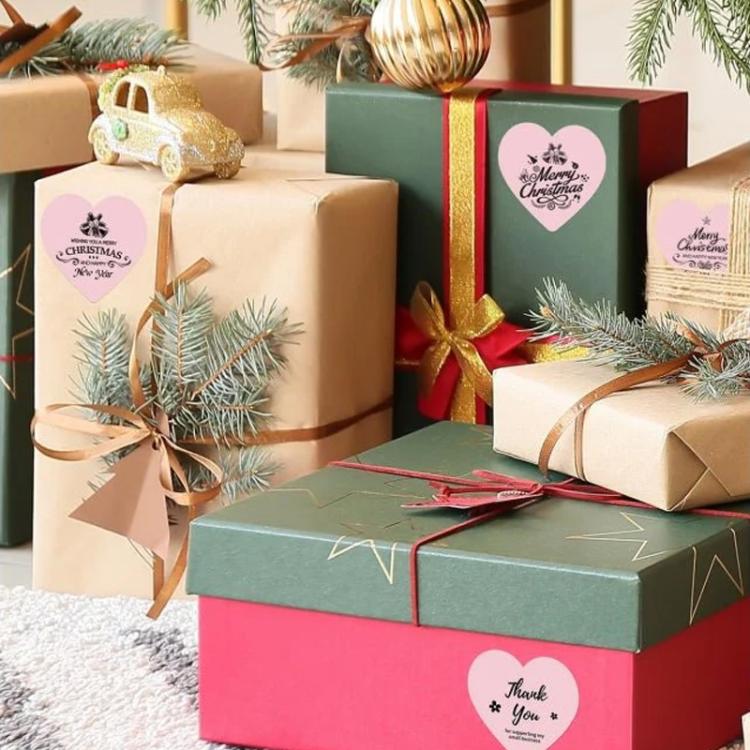 Round 'Thank You' labels on wrapped gift boxes, sticker-style design.