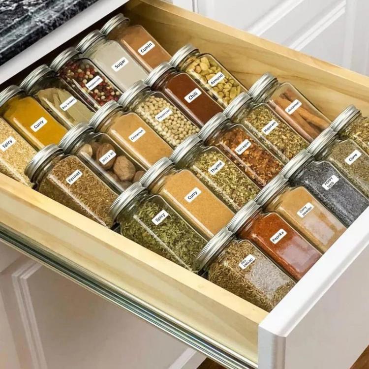 Thermal labels on glass pantry jars for organized storage