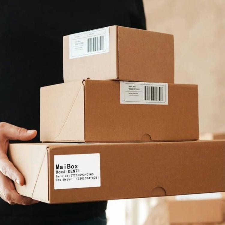 Phomemo shipping boxes with white thermal barcode labels, 4x3 inch size