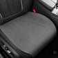 Car seat cushion in gray fabric with laser-perforation pattern and stitched border