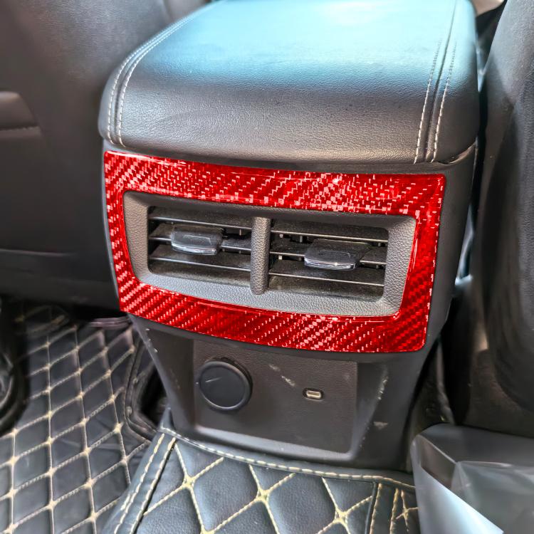 Rear air vent frame sticker installed, carbon-fiber red with rectangular cutout over vent