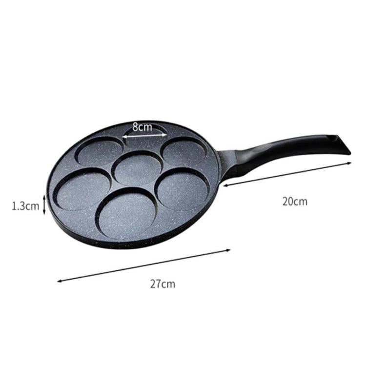 7-cup round nonstick egg pan with smooth base wells and long black handle.