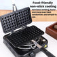 Double non-stick waffle plates open, showing a raised waffle grid pattern