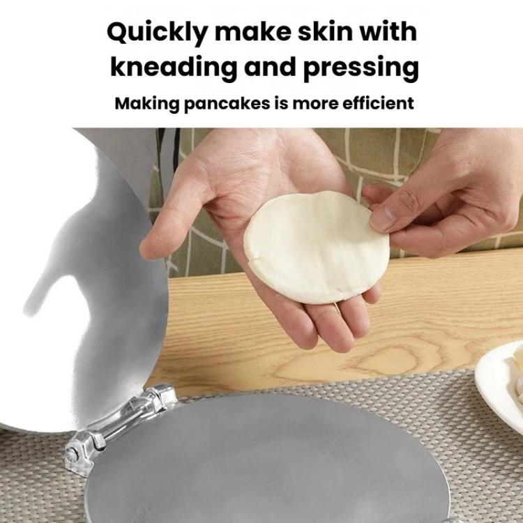 Manual dough wrapper press pressing a round dough skin onto the base