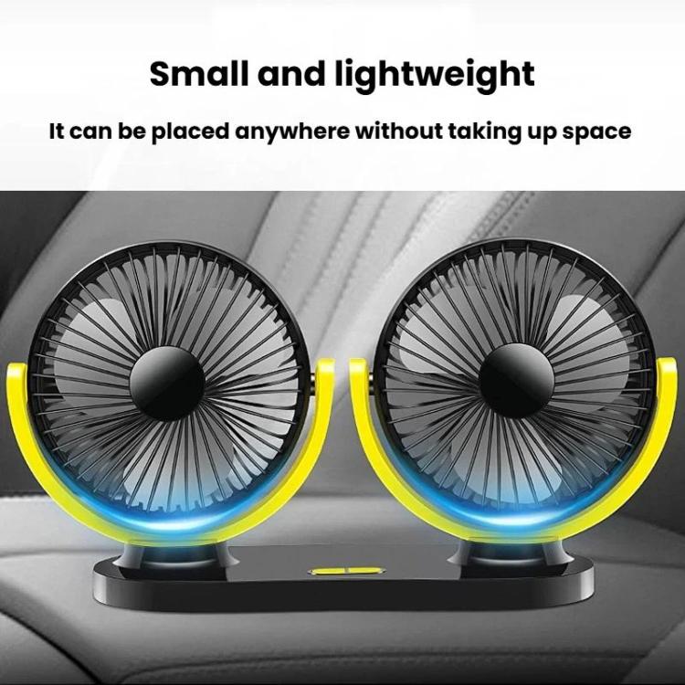 Dual-head portable fan with black grille and yellow support arms on dashboard