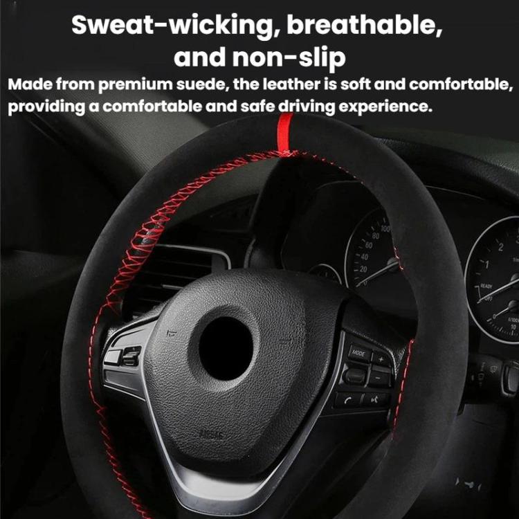 Suede steering wheel cover on steering wheel, black with red stitched edge