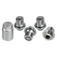 Close-up view of anti-theft wheel lock lug nuts set with key and threaded insert