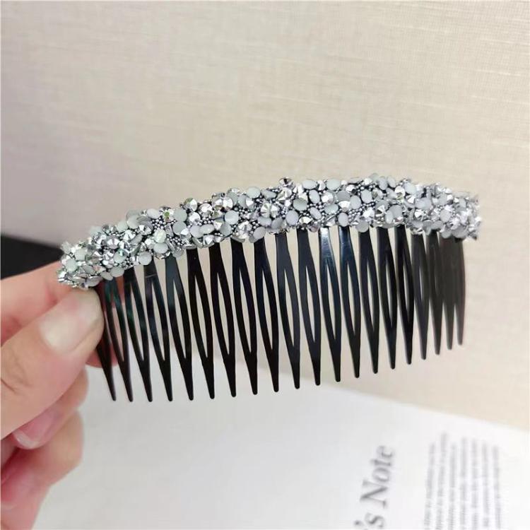 Sparkly hair clip comb with silver rhinestone top and black comb teeth