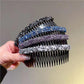 Sparkly hair clip comb with black base and blue, purple, and silver rhinestone bands
