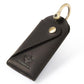 Leather key pouch in black with metal keyring and snap button closure