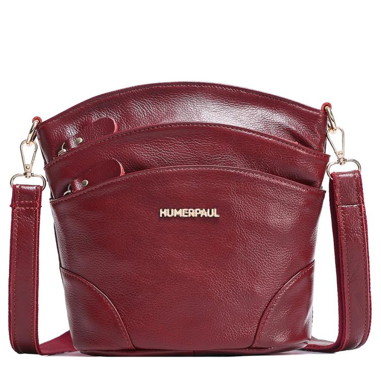 Red leather shoulder crossbody bag with flap closure and crossbody shoulder strap