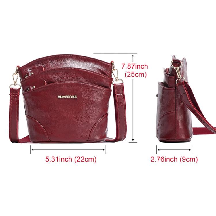 Red leather crossbody bag with flap, front pocket, and crossbody straps