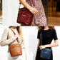 Women’s leather crossbody bags in burgundy, tan, and blue worn across shoulder