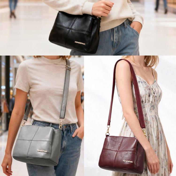 Leather crossbody shoulder bag in gray, with top handle and adjustable strap