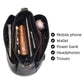 Black leather crossbody bag interior view with hanging items and organizer space