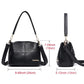 Black leather crossbody shoulder bag with top handle and adjustable strap