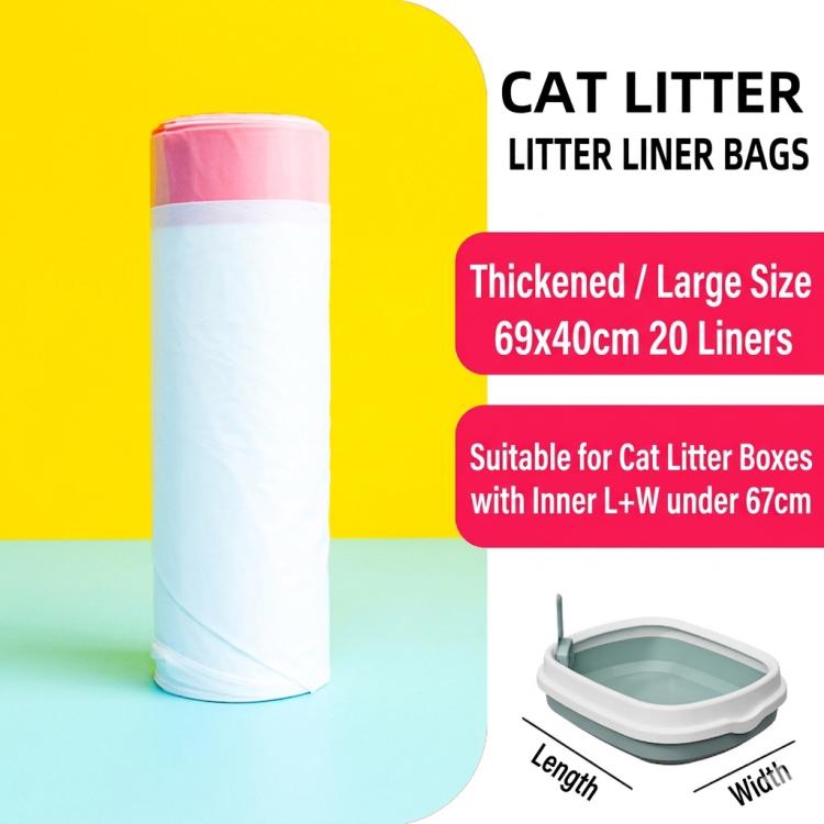 White cat litter liner bag roll with pink top lid beside litter tray