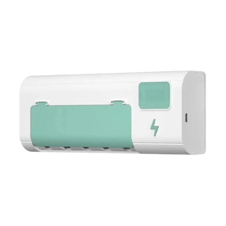 White wall-mounted toothbrush sanitizer stand with green charging holder and small display window