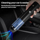Black handheld car vacuum cleaner with blue dust bin and crevice nozzle