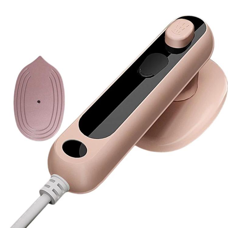 Pink handheld steamer iron with steam plate and side vent opening