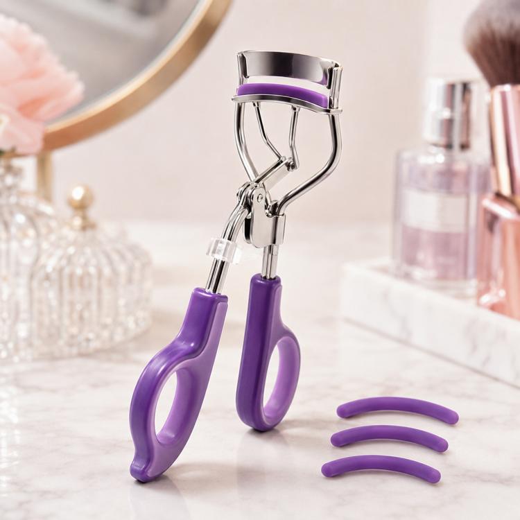 Purple eyelash curler refill pads with eyelash curler, curved rubber inserts
