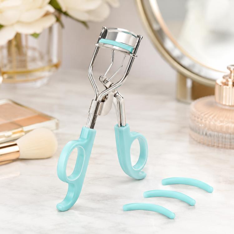 Teal eyelash curler refill pads with eyelash curler, curved rubber inserts
