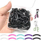 Clear box of eyelash curler refill pads, black and pastel curved rubber inserts