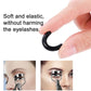 Black eyelash curler refill pad, soft elastic curved rubber insert held in fingers
