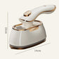 White portable garment steamer, compact handheld design with gold base accents