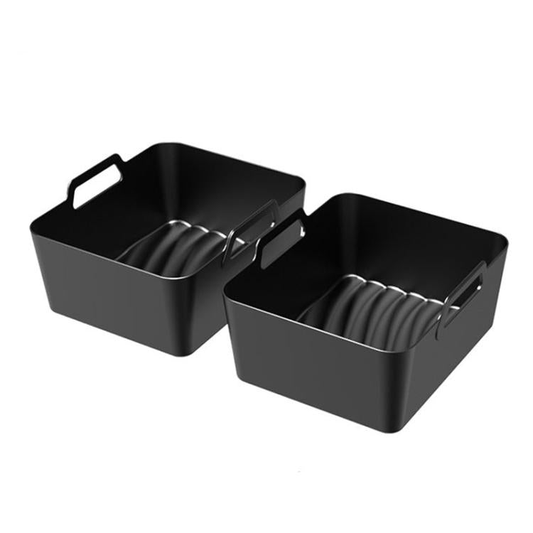 Black silicone air fryer liner tray set with two ridged compartments and handles