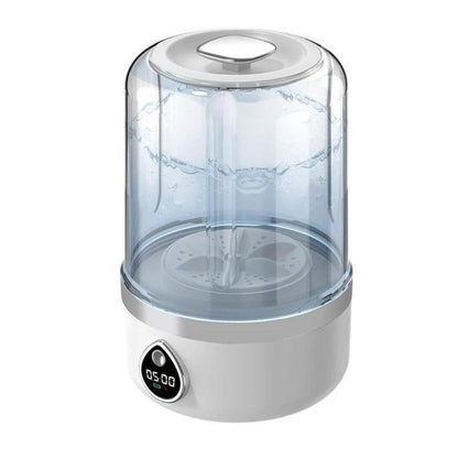 Mini portable washing machine with clear top and white base, digital display