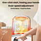 Mini portable washing machine with clear chamber and white base, finger on display