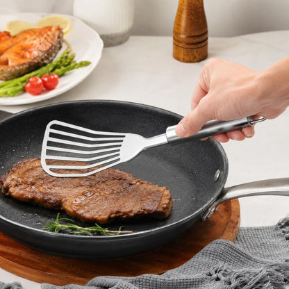 Stainless steel slotted steak and fish spatula with angled fork head