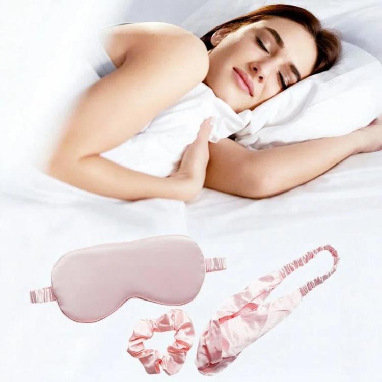 Pink satin sleep eye mask with matching hair scrunchie and elastic headband set