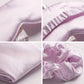 Lavender satin fabric details with elastic trim and scrunchie texture