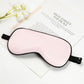 Light pink silk sleep mask with adjustable buckle and latex strap