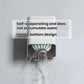 Toilet brush holder base showing water droplets dripping from the bottom